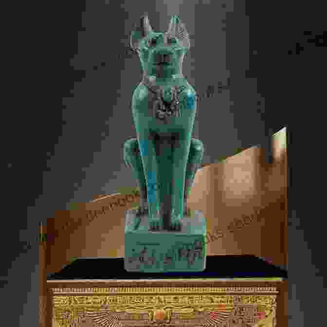 A Golden Statue Of The Egyptian Goddess Bastet, Depicted As A Woman With The Head Of A Cat. A History Of Art In 21 Cats: From The Old Masters To The Modernists The Moggy As Muse: An Illustrated Guide