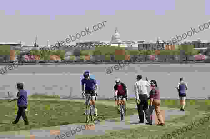 Cyclists Riding Along The Mount Vernon Trail With The Potomac River In The Background Best Easy Bike Rides Washington DC (Best Bike Rides Series)