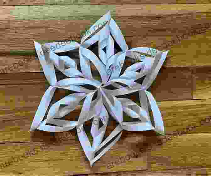 Intricate Paper Snowflakes Hanging From A Window Stitch The Halls : 12 Decorations To Make For Christmas (What Delilah Did)